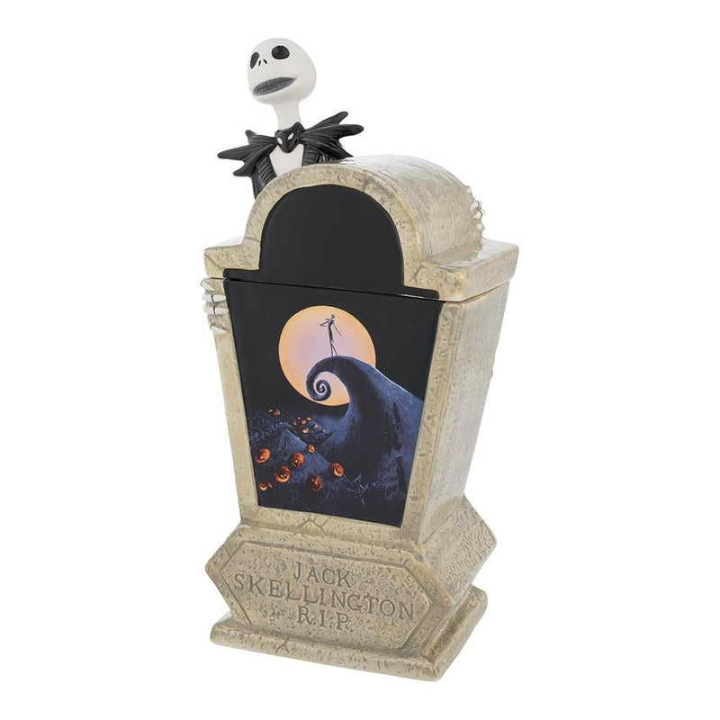 This is a Nightmare Before Christmas Jack Skellington Sculpted Cookie Jar and it is shaped like a tombstone and has Jack standing in front of the moon over a black background.