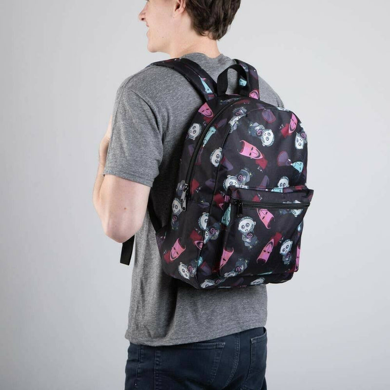 This is a Nightmare Before Christmas Lock Shock and Barrel backpack that is black, with a black handle, with a front zipper pocket, padded should straps and is on a guy wearing a grey shirt.