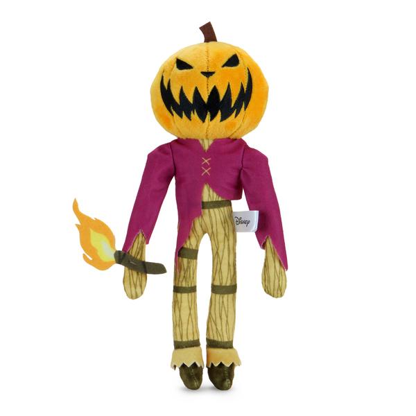 This is a Nightmare Before Christmas Jack Skellington Pumpkin King Phunny plush and he has a pumpkin head, purple shirt, torch with fire and he has black triangle eyes and nose and a pointy scary mouth. 