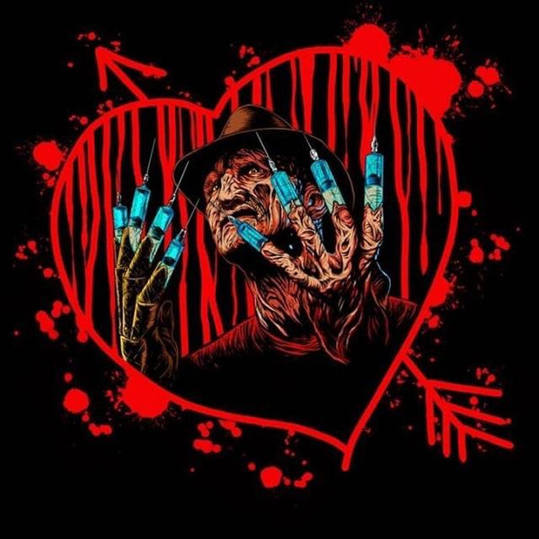 This is a Nightmare On Elm Street Freddy heart sticker and he has a burnt face, brown hat and syringes for fingers. 