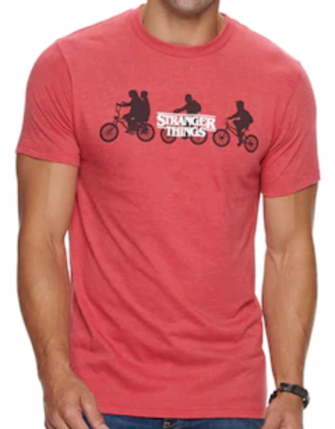 This is a red Stranger Things T-shirt with white letters and kids riding bikes.