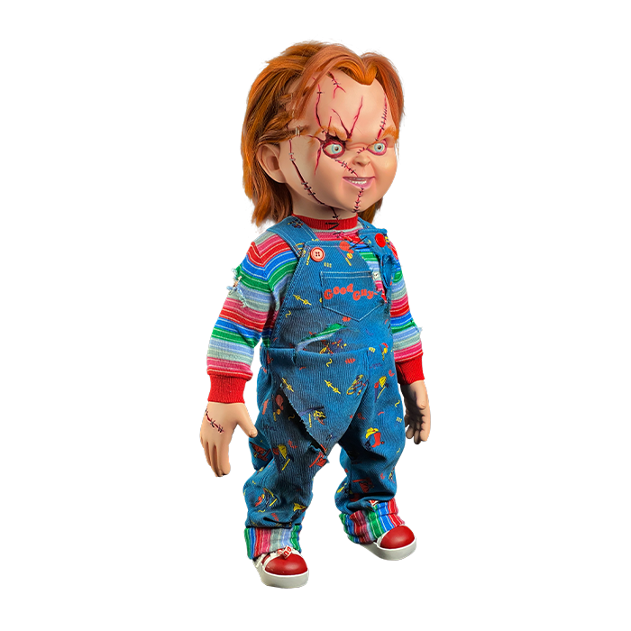 This is a Seed of Chucky life sized doll and he has blue overalls, striped shirt, orange hair, scars on his face and red shoes. 