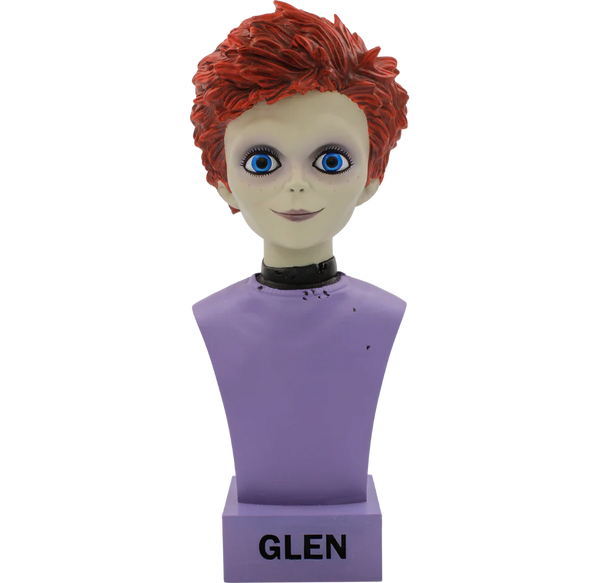 This is a Seed f Chucky Glen bust and they have on a purple shirt, blue eyes and orange hair