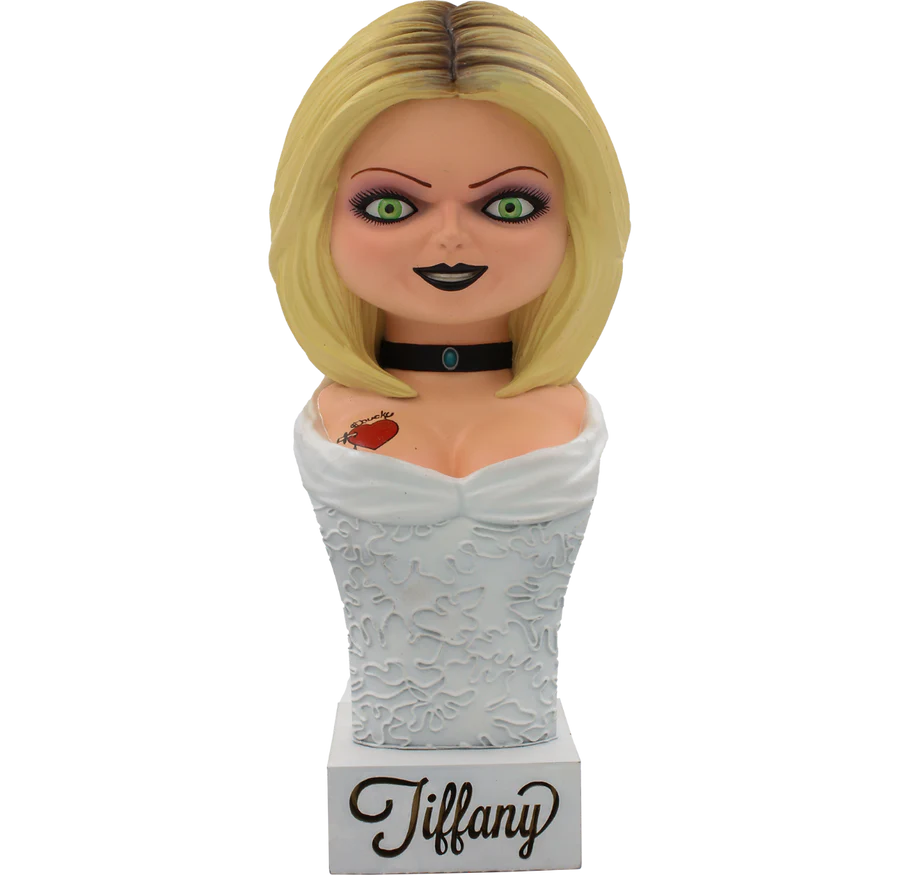 This is a Seed of Chucky Tiffany bust that is 15" and she is wearing a white lace wedding dress, black leather jacket, black choker and she has blonde hair and green eyes