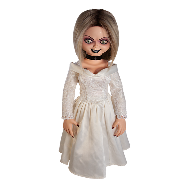 This is a Seed of Chucky Tiffany life size doll and she is wearing a white wedding dress.