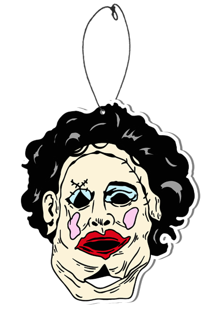 This is a 1974 Texas Chainsaw Massacre Pretty Woman air freshener and it is a tan face with dark hair, blue eye shadow and red lips.