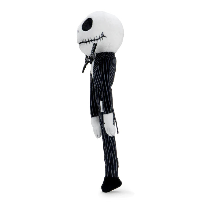 This is a Nightmare Before Christmas Jack Skellington Kidrobot plush and he has a black and white striped suit with a bat on the neck, white hand, white face, black eyes and stitched mouth and black feet.