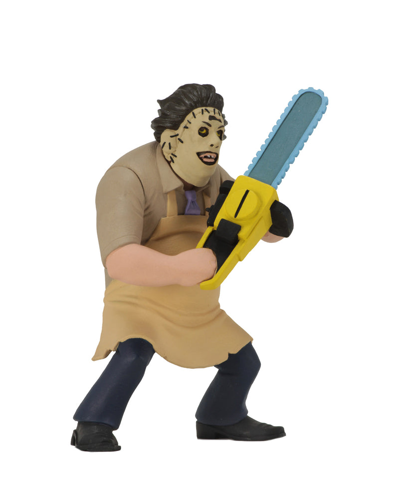 Leatherface NECA is standing in front of a white background wearing a killing mask, while wearing a yellow apron and holding a yellow chainsaw.