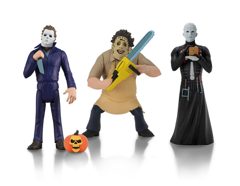 Michael Myers is holding a knife and has a pumpkin at his feet, while Leatherface is holding a yellow chainsaw and wearing a yellow apron and Pinhead is standing in a black dress, while holding a brown box.