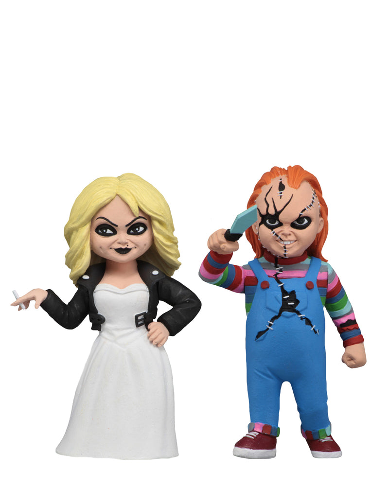 Chucky NECA action figure is wearing a striped shirt with coveralls, holding a knife and standing next to Tiffany in a white wedding dress, who is holding a cigarette.