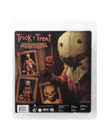 This is a Trick 'R Treat Sam NECA 8" clothed action figure and he is wearing an orange costume and has a burlap mask and bitten lollipop.