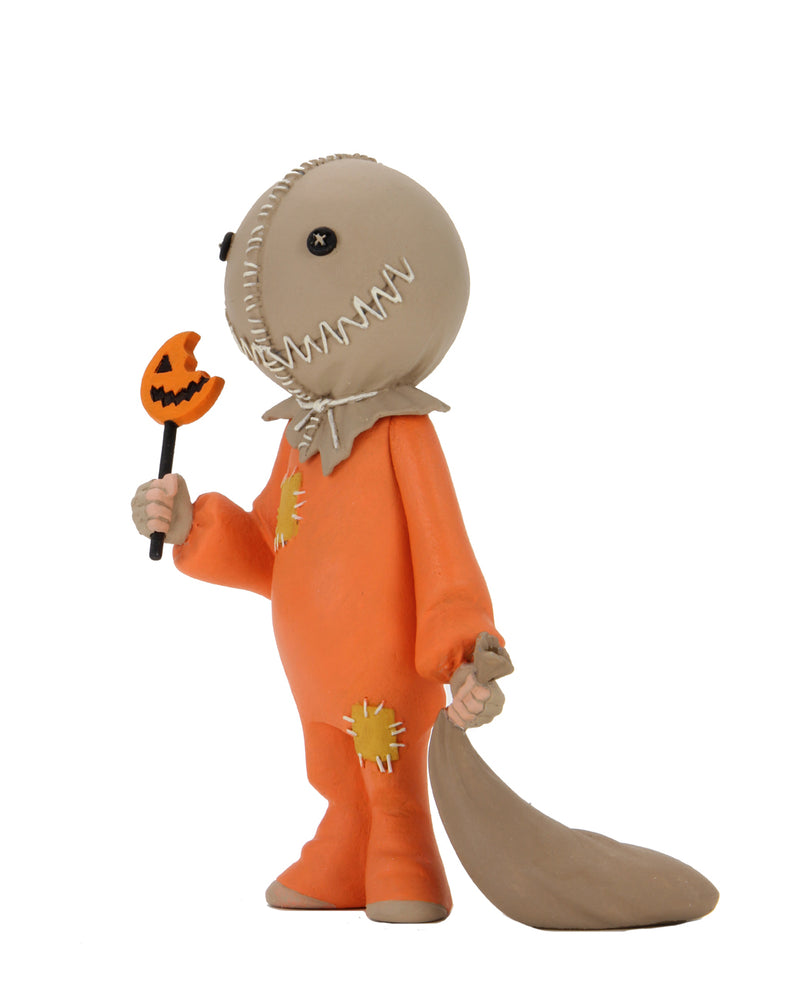 This is the Toony Terrors NECA action figure series 4 Sam from Trick 'R Treat and he has an orange suit, burlap mask, burlap sack and a bitten lollipop..