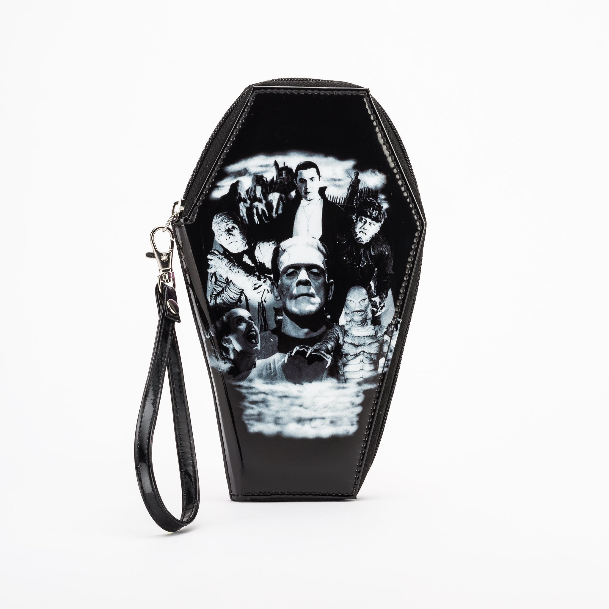 This is a Universal Monsters glitter coffin wallet that is black vegan leather and has Frankenstein, bride, Dracula, wolfman, mummy and creature from the black lagoon.
