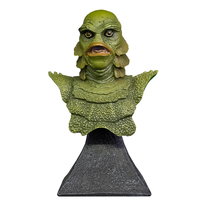 This is a Universal Monsters Creature From the Black Lagoon mini bust that is a green monster with big lips and he is on a grey stand.