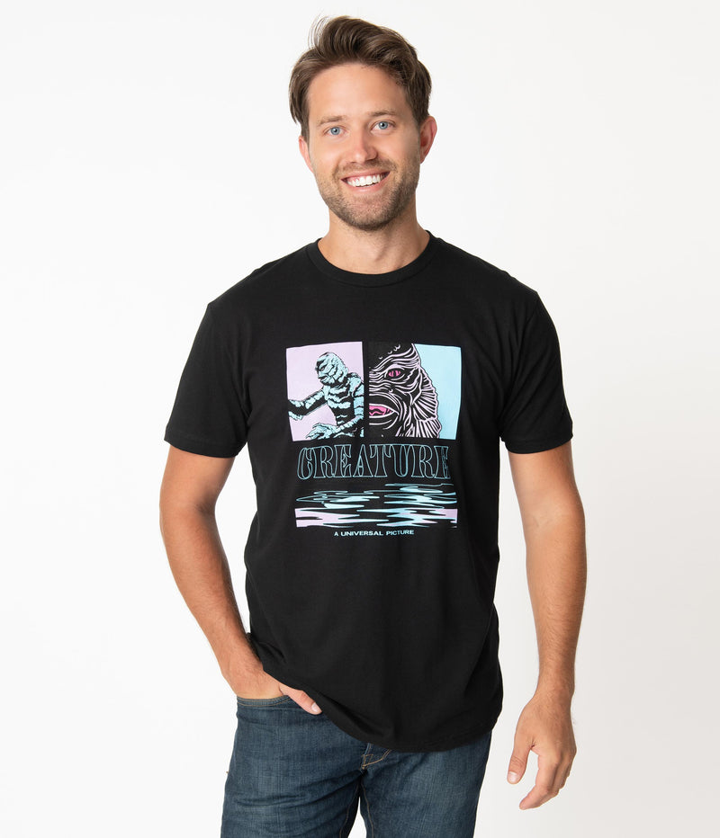 This is a Universal Monsters Creature From the Black Lagoon Unisex Tshirt by Unique Vintage and it is black with pink and blue graphic and creature has gills and scales and the model is a man with dark blonde hair. 