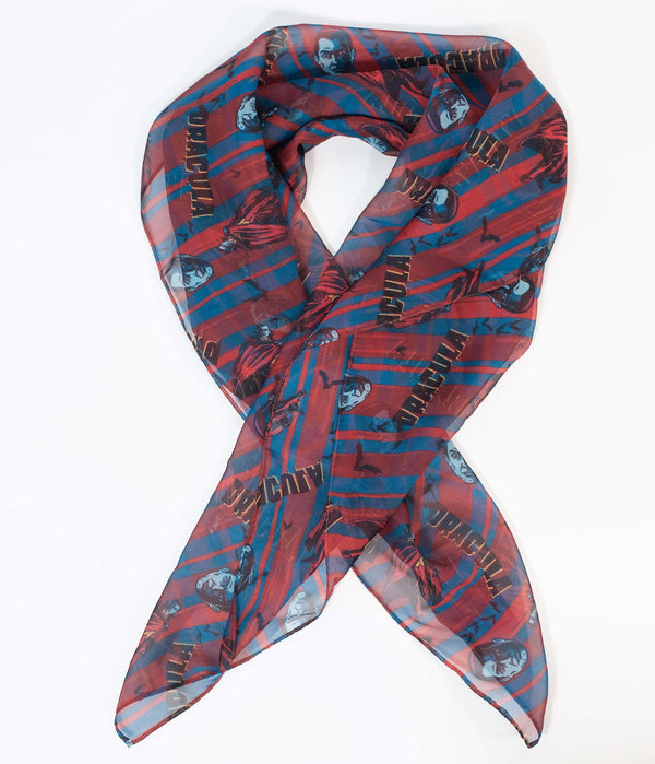 This is a Universal Monsters Dracula chiffon hair scarf by Unique Vintage and it is red and blue with his head.