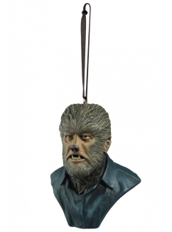 This is a Universal Monsters Wolfman ornament of a man with fur on his face and neck, pointy teeth and a button up blue shirt.