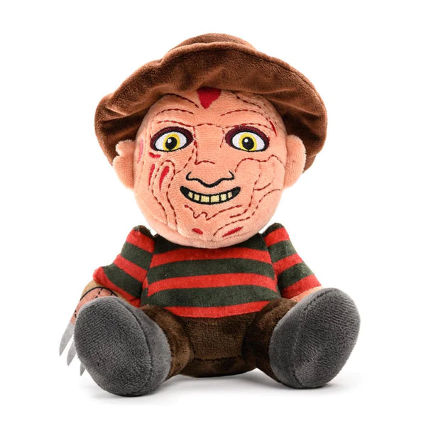 This is a Nightmare On Elm Street Freddy Krueger plush and he has a brown hat, red and green striped sweater, brown pants, yellow eyes and a burnt face.