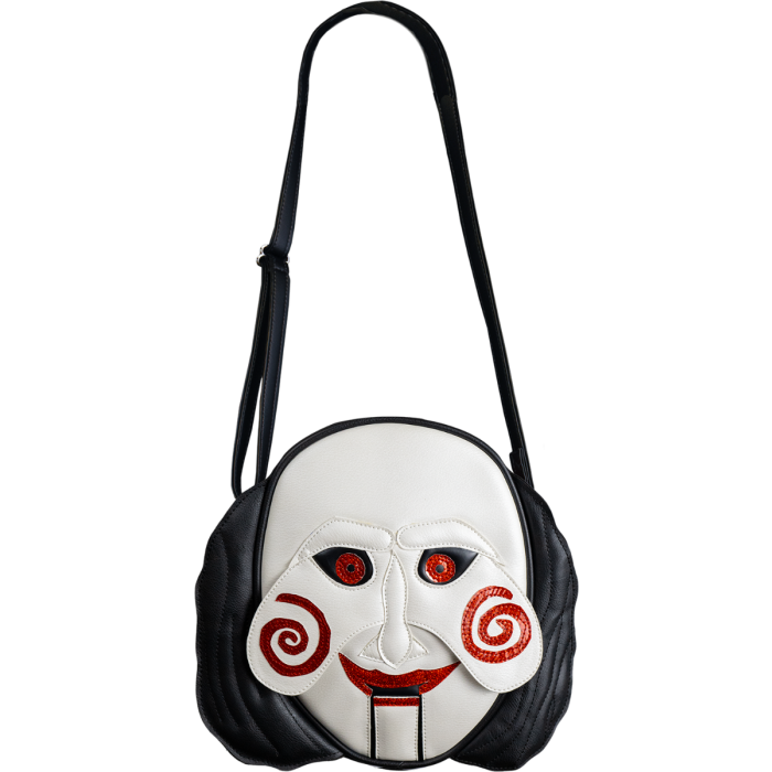 This is a Saw Jigsaw Billy purse and he has a white face, red eyes, red lips, red spiral cheeks and black hair.