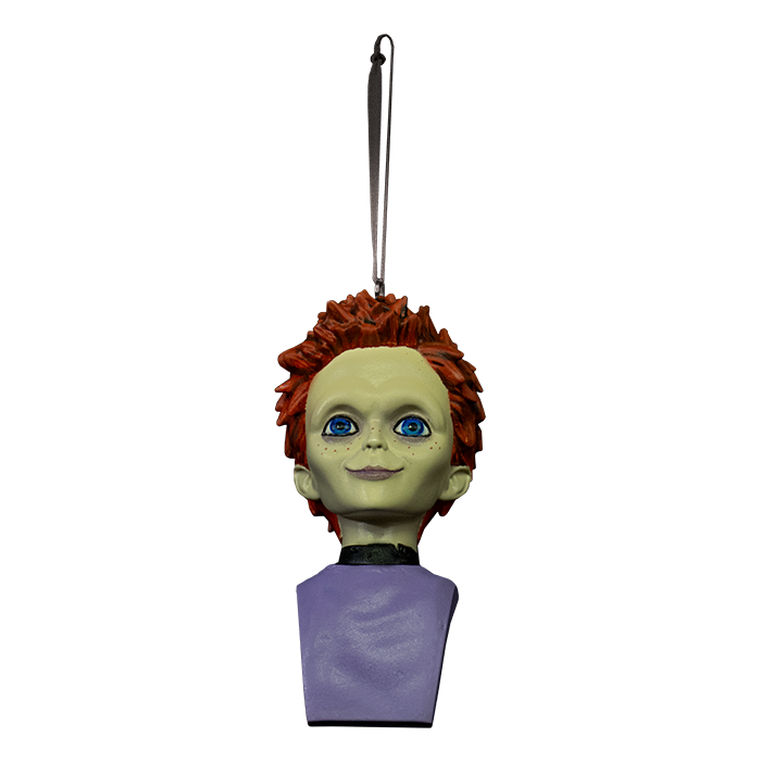 This is a Seed Of Chucky Glen ornament and he has orange hair, blue eyes, purple shirt and he is hanging from a ribbon.