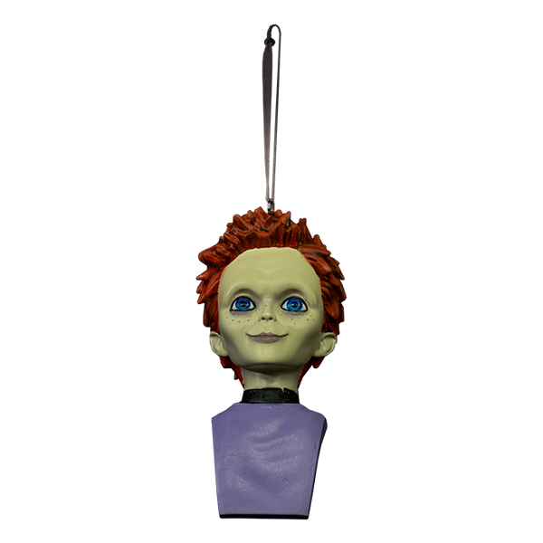 This is a Seed Of Chucky Glen ornament and he has orange hair, blue eyes, purple shirt and he is hanging from a ribbon.